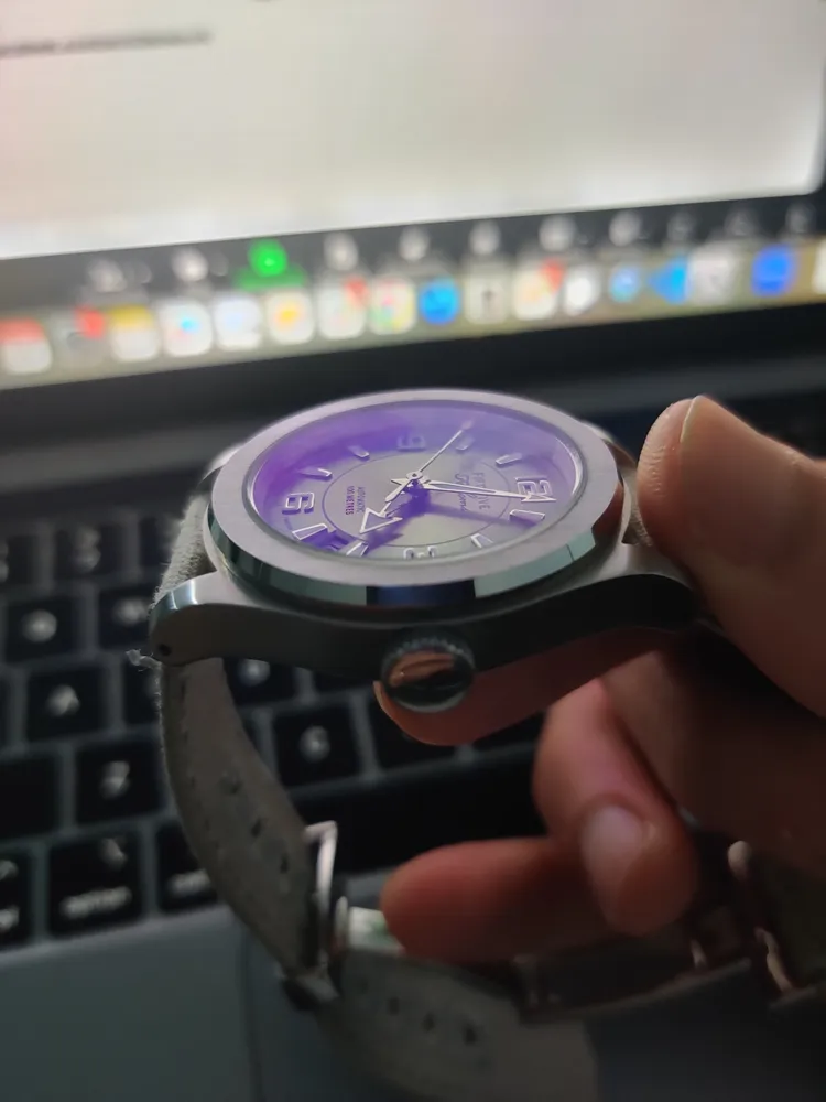 Macro shot of a purple watch dial
